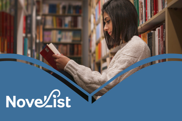 Novelist resource image showing a woman sitting on the floor of the library with an open book